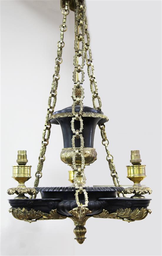 A pair of Regency style bronze and ormolu electroliers, made for the film Anna Karenina, Drop 2ft 8in. Diam.1ft 4in.